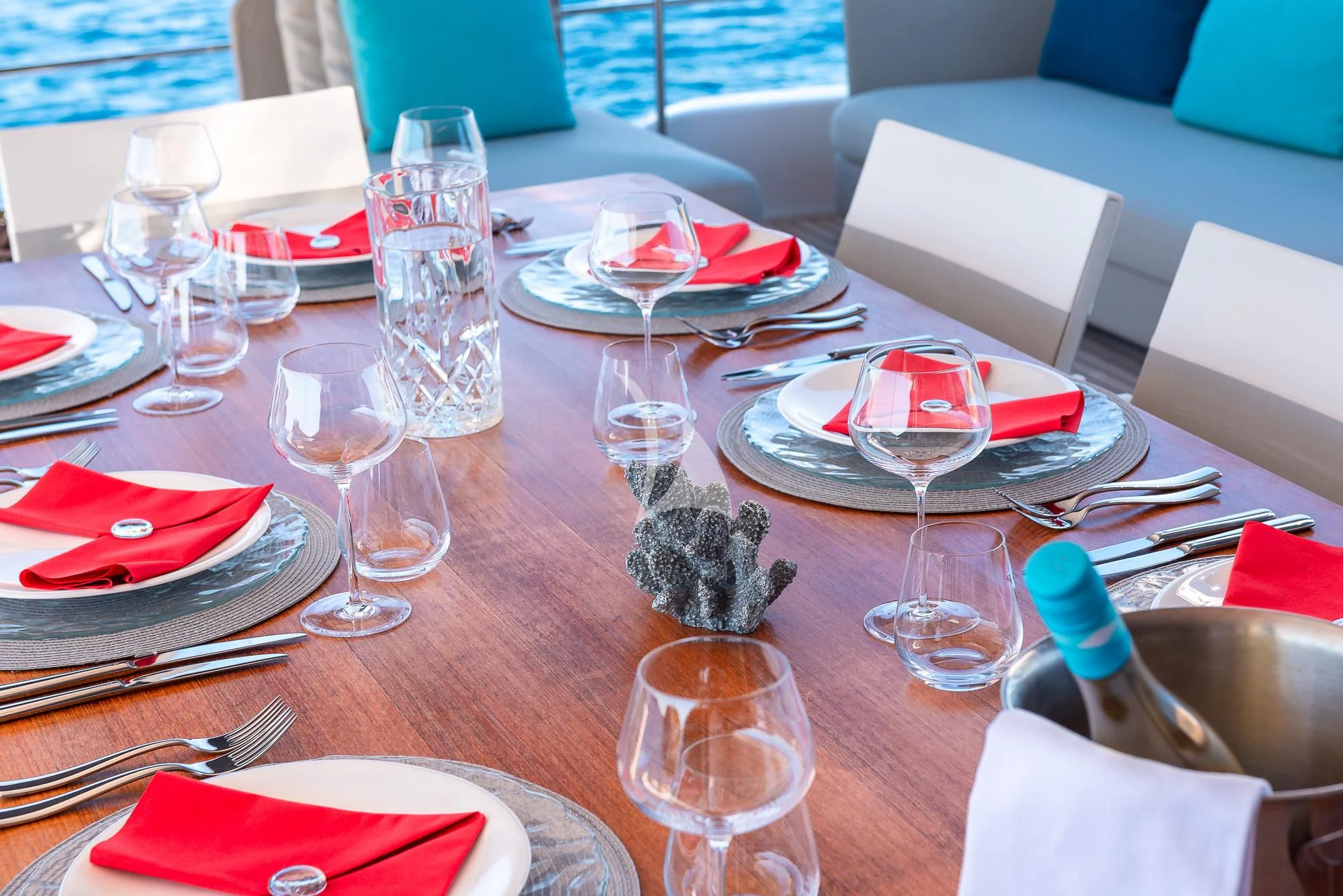 a table with place settings aboard ACQUA Yacht for Sale