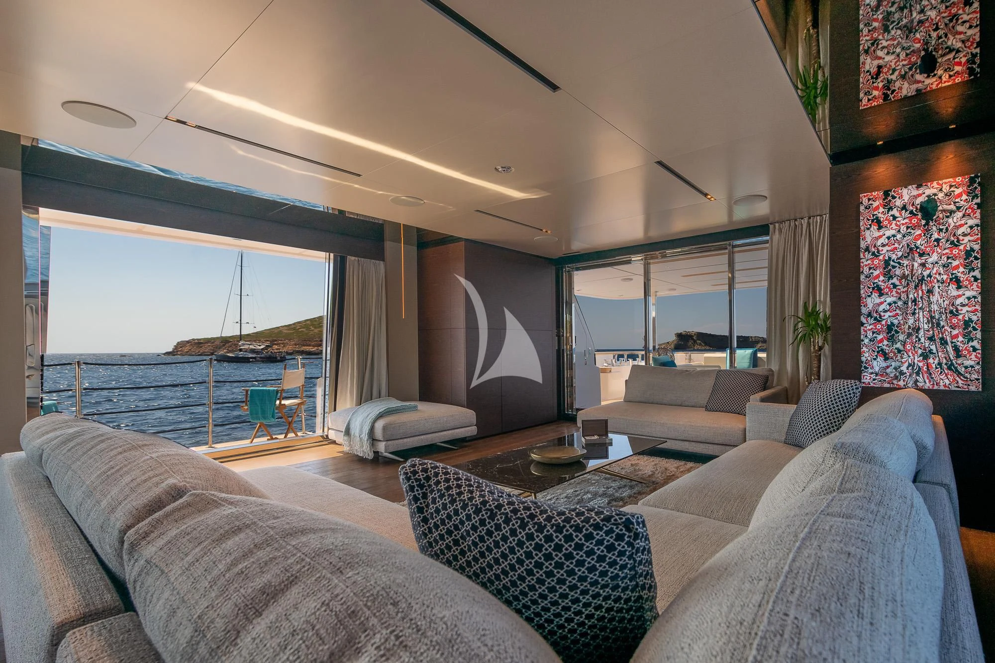 a living room with a large window aboard ACQUA Yacht for Sale