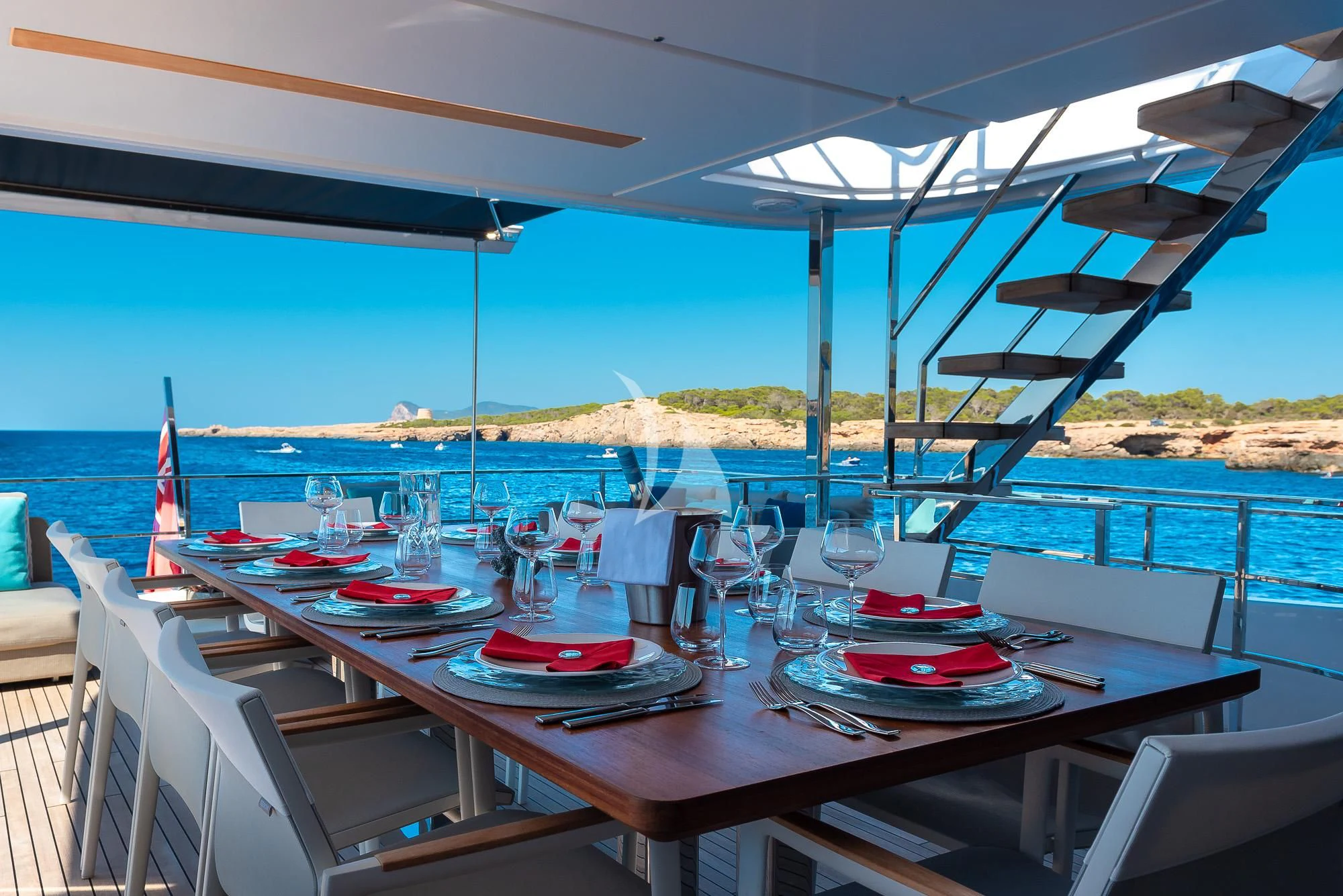 a table set for a meal on a boat aboard ACQUA Yacht for Sale