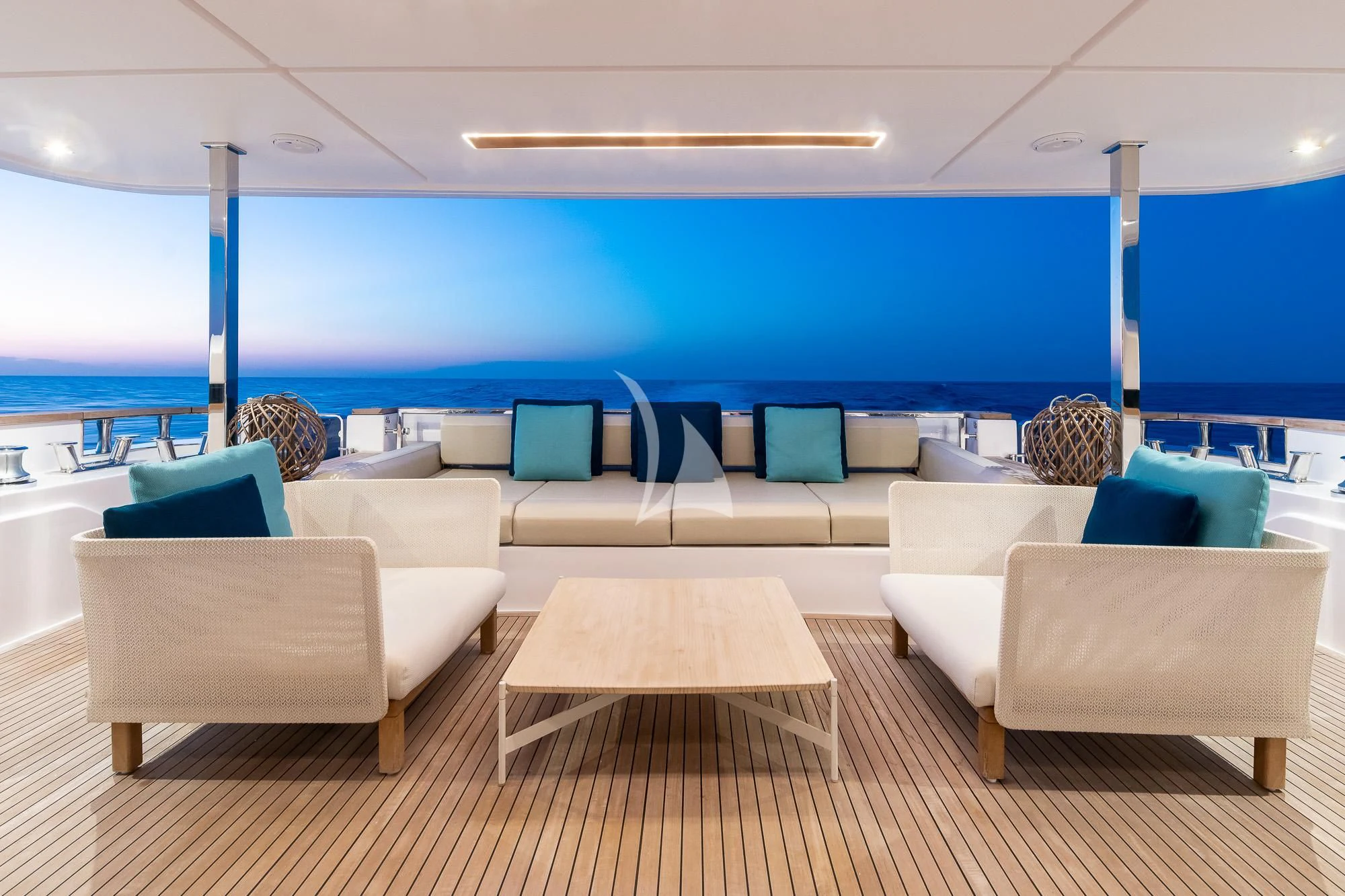 a room with a couch and a table and chairs aboard ACQUA Yacht for Sale