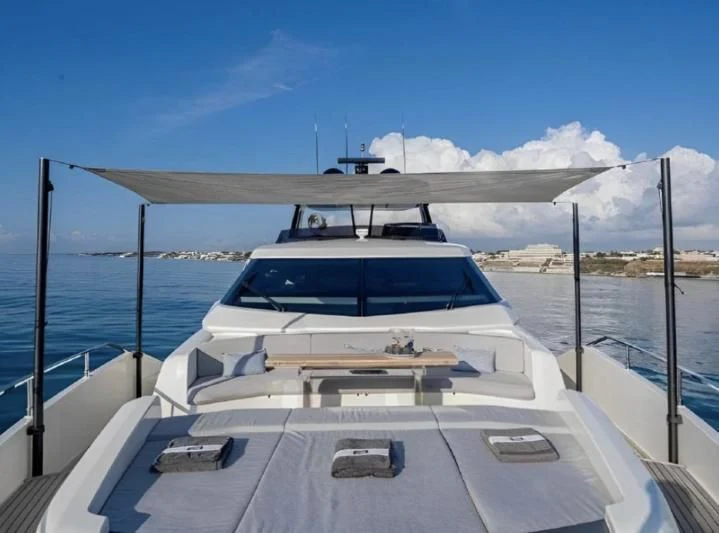 a boat on a deck aboard YEMAJA Yacht for Sale