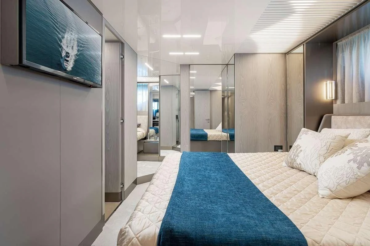 a bed in a room aboard YEMAJA Yacht for Sale