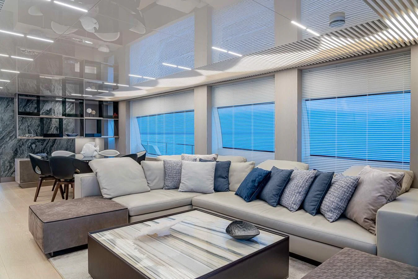 a living room with a couch and a table aboard YEMAJA Yacht for Sale