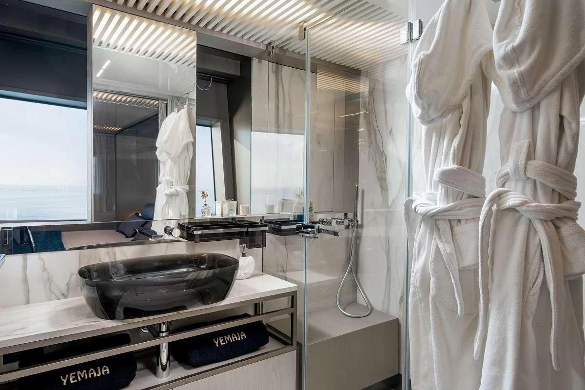 a large bathroom with a large sink aboard YEMAJA Yacht for Sale