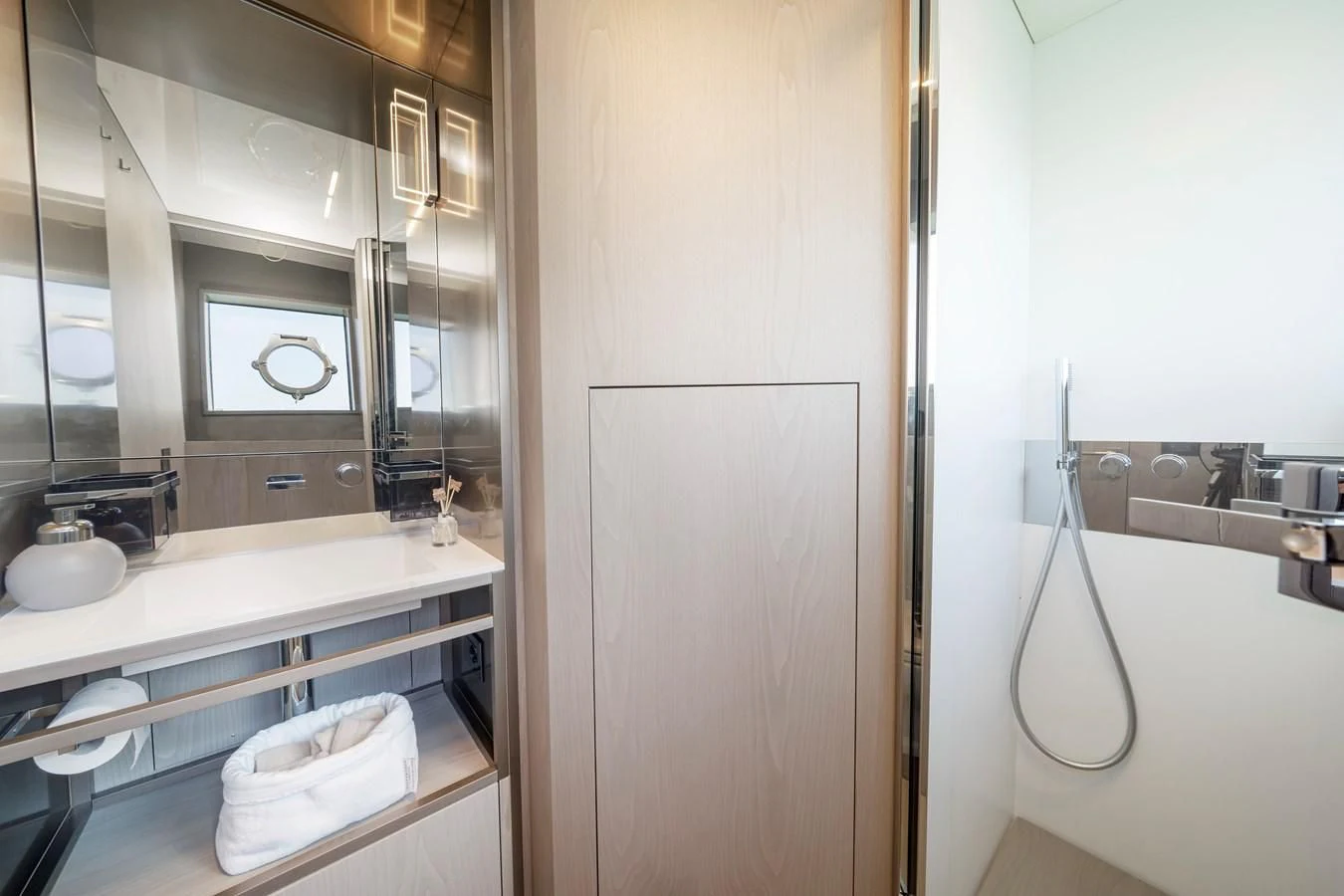 a bathroom with a sink and a shower aboard YEMAJA Yacht for Sale
