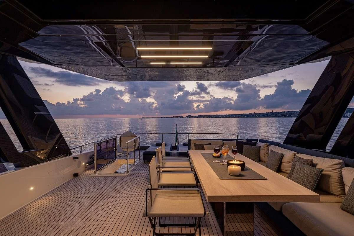 a room with a table and chairs aboard YEMAJA Yacht for Sale