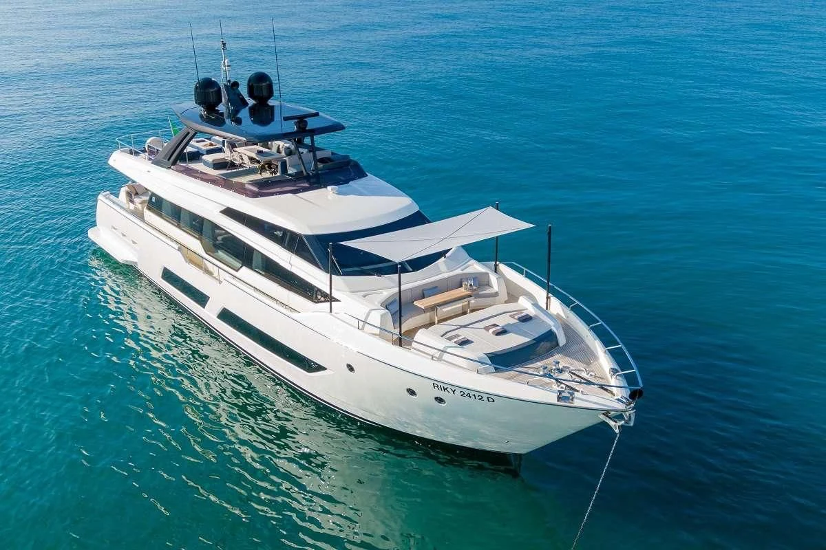 a white boat in the water aboard YEMAJA Yacht for Sale