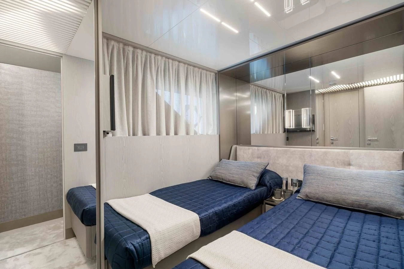 a room with a bed and a couch aboard YEMAJA Yacht for Sale