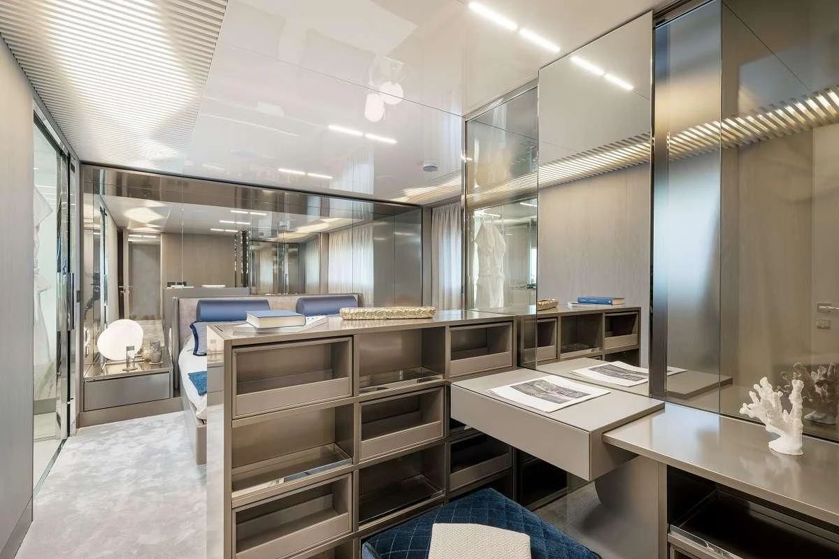 a large room with glass walls aboard YEMAJA Yacht for Sale