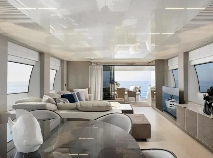 a living room with a large window aboard YEMAJA Yacht for Sale