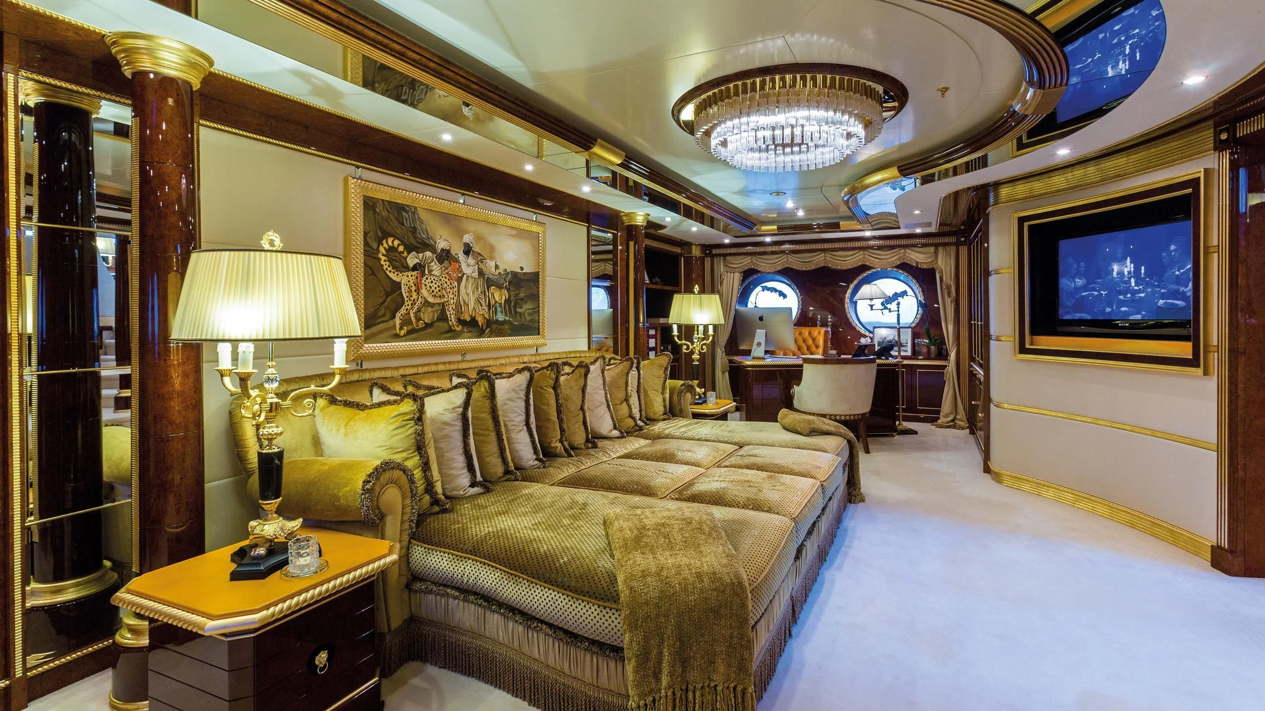 a living room with a large mirror aboard SORRENTO Yacht for Sale