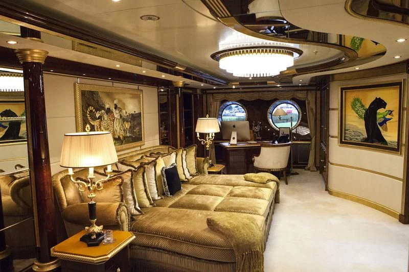 a living room with a large window aboard SORRENTO Yacht for Sale