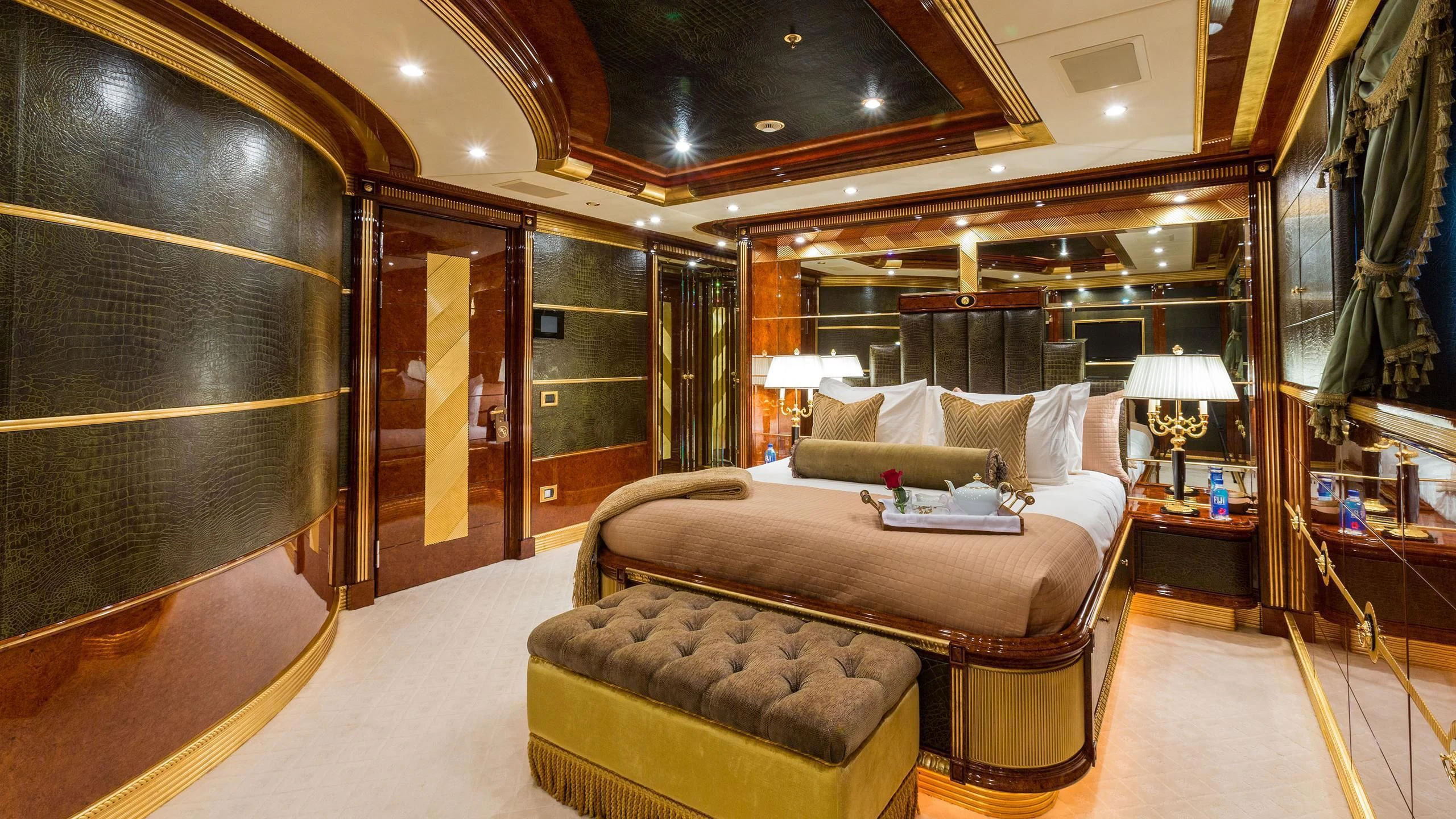 a large bedroom with a large bed aboard SORRENTO Yacht for Sale