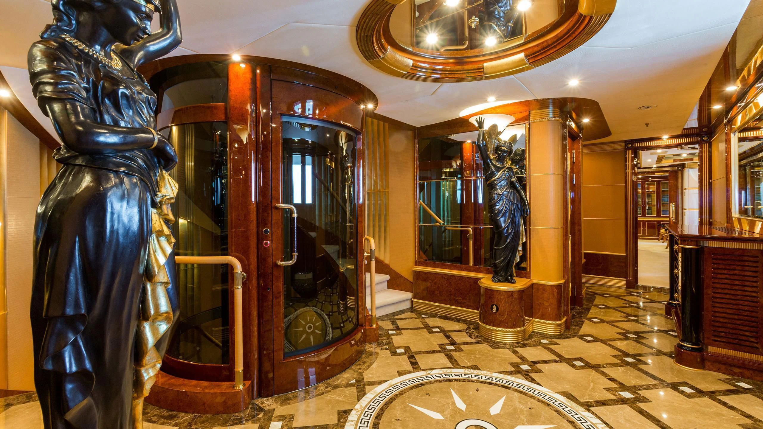 a large room with a large mirror aboard SORRENTO Yacht for Sale