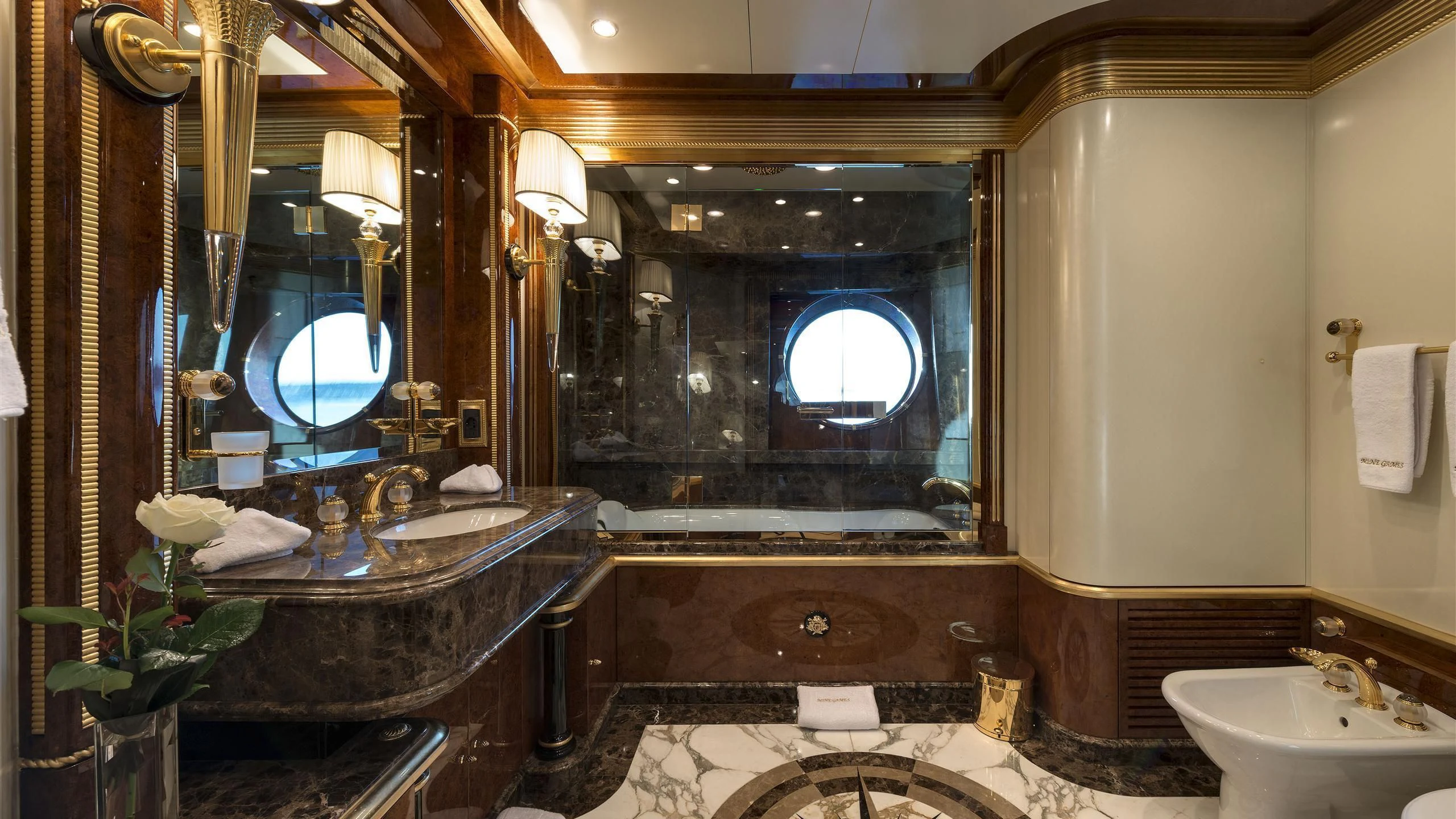 a bathroom with a large mirror aboard SORRENTO Yacht for Sale