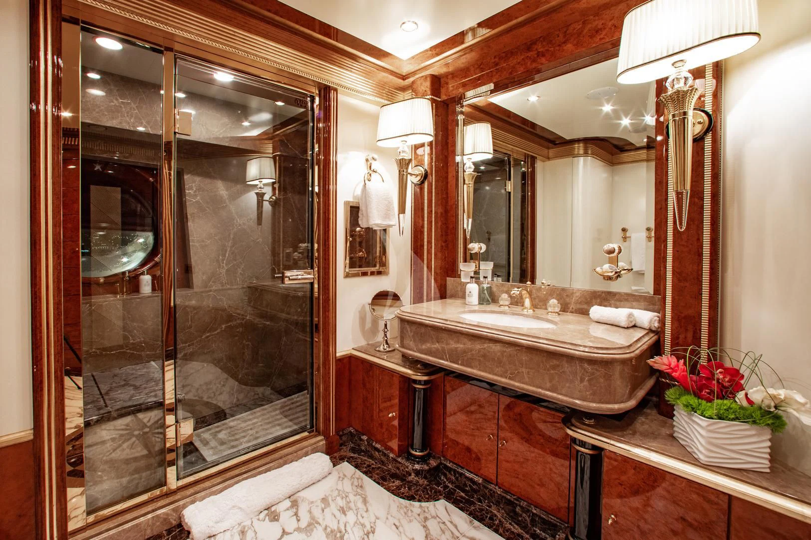 a bathroom with a large glass shower aboard SORRENTO Yacht for Sale