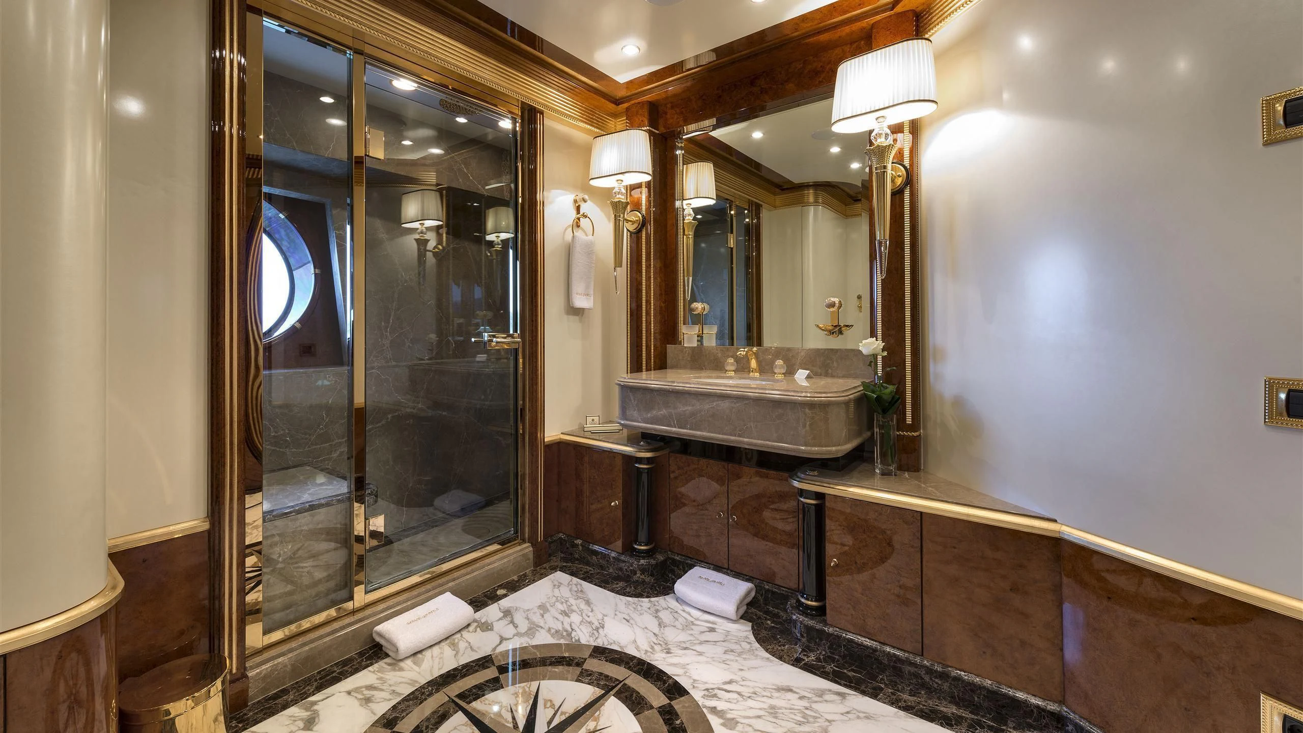 a bathroom with a large glass shower aboard SORRENTO Yacht for Sale