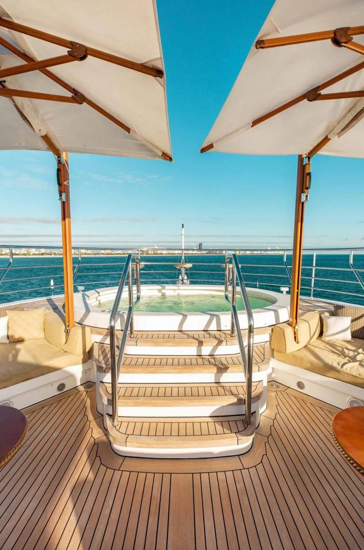 a deck with a view of the ocean and the ocean aboard SORRENTO Yacht for Sale