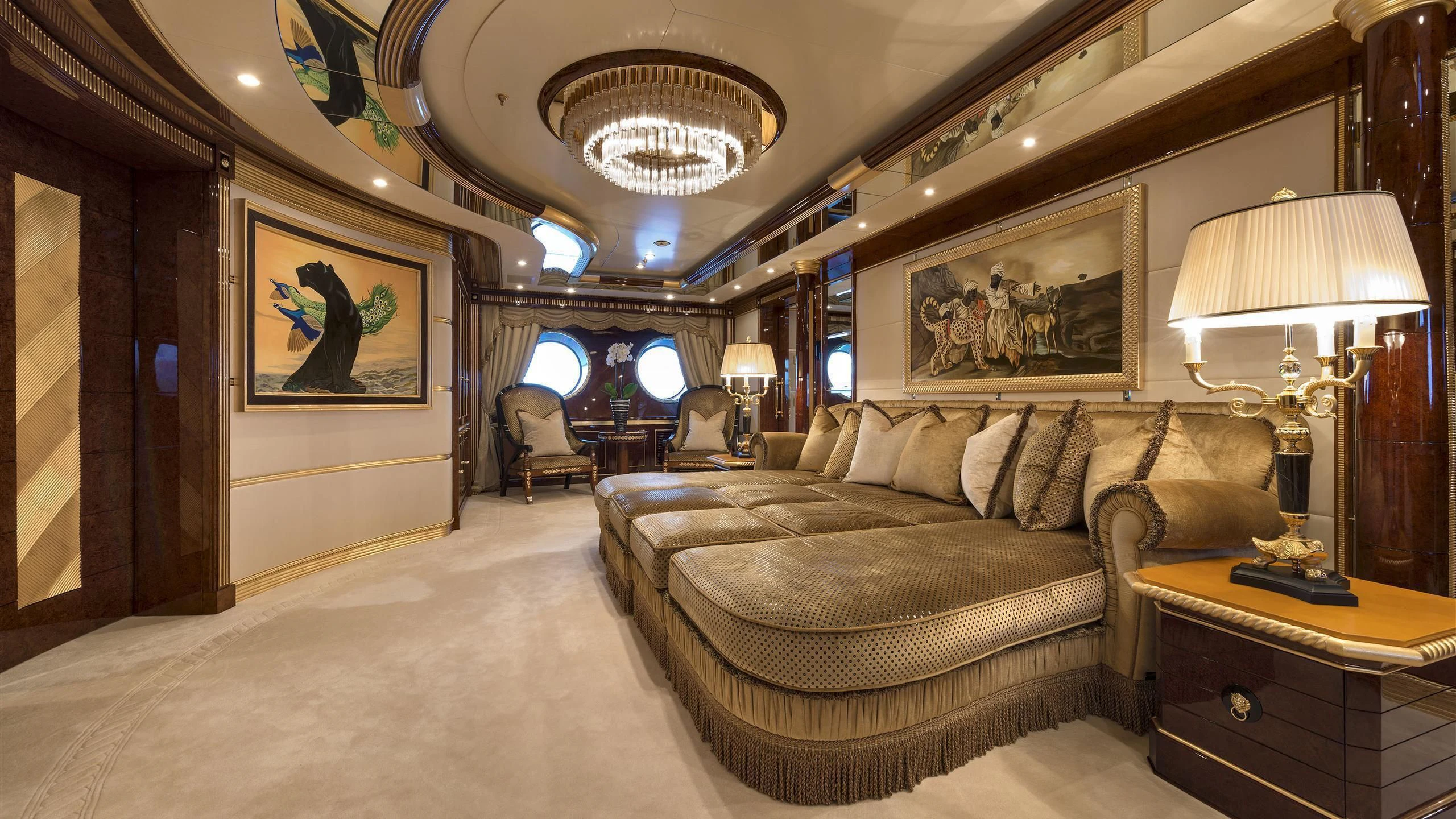 a living room with a couch and a table aboard SORRENTO Yacht for Sale