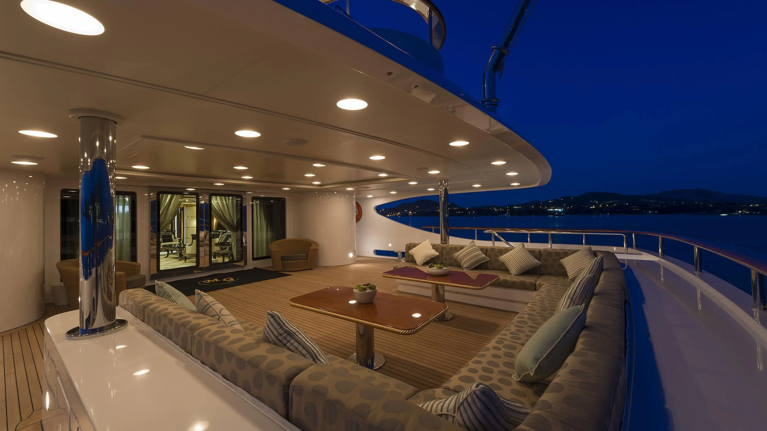 a large living room with a large pool aboard SORRENTO Yacht for Sale