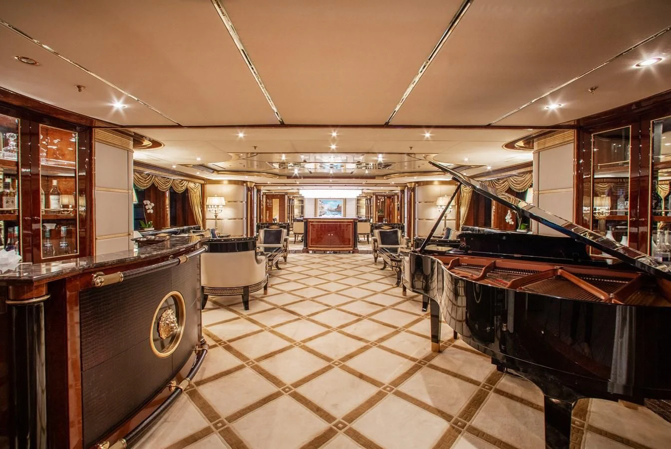 a bar with a table and chairs aboard SORRENTO Yacht for Sale