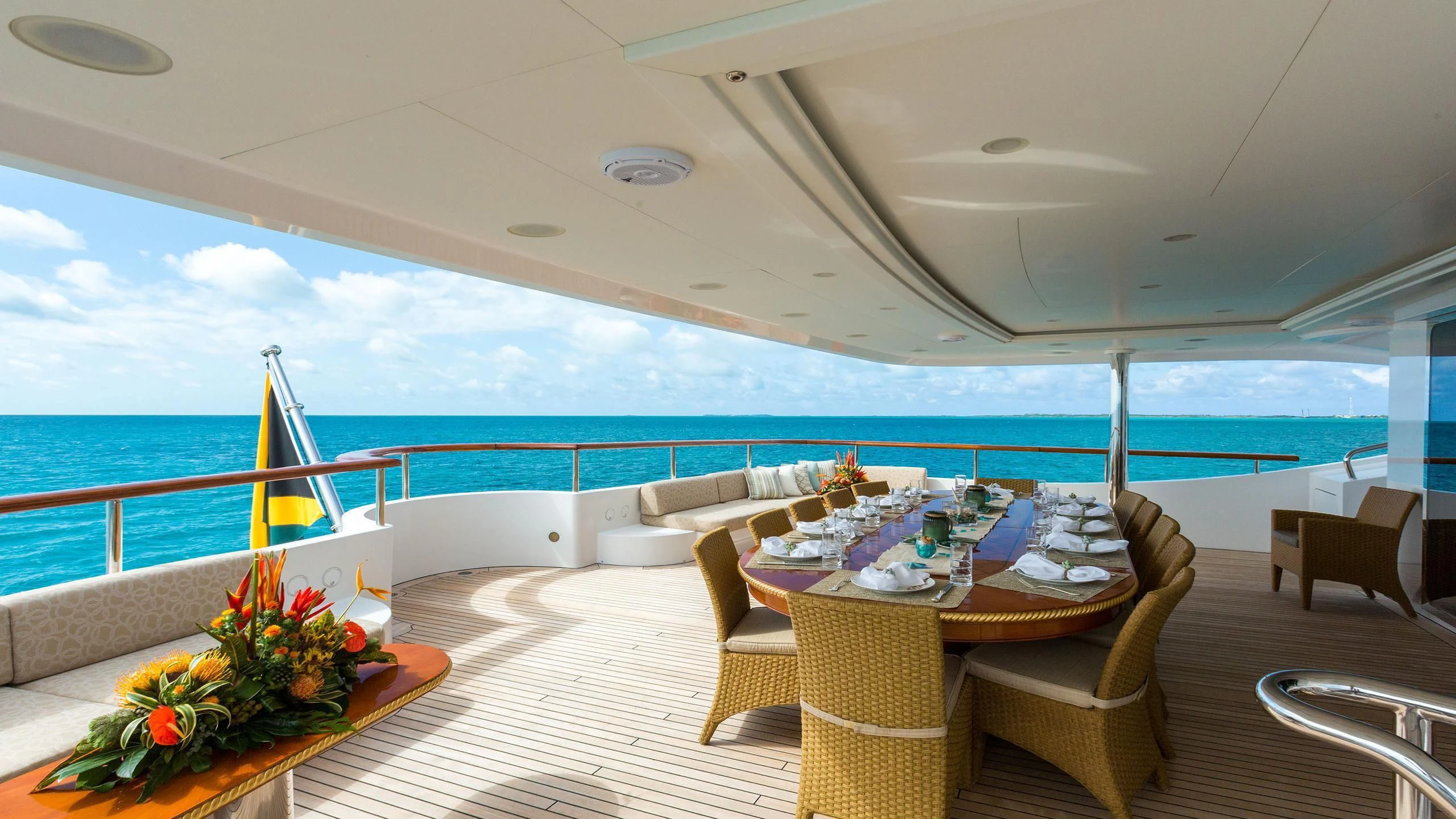 a room with a table and chairs aboard SORRENTO Yacht for Sale