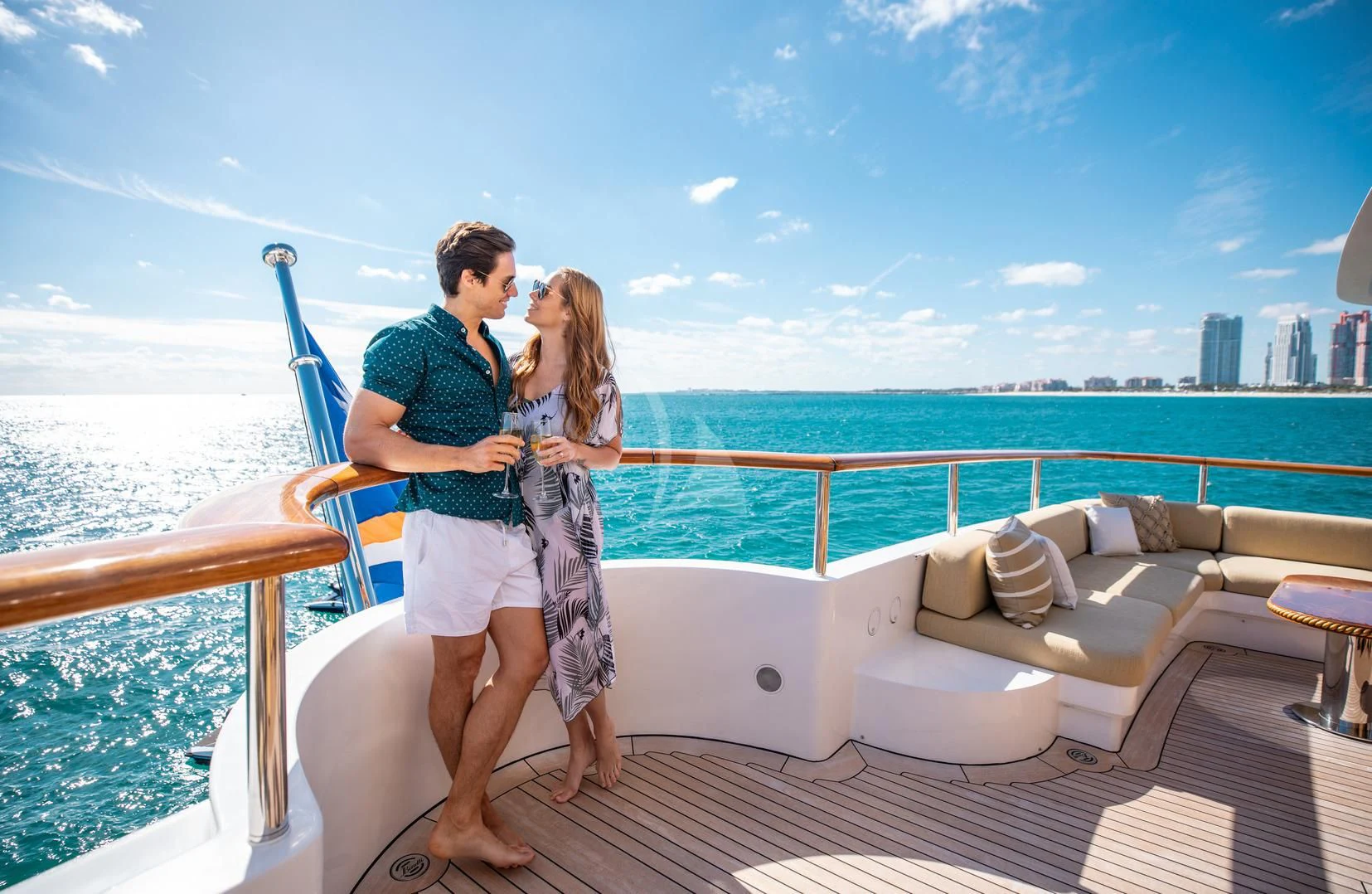 a man and woman on a balcony aboard SORRENTO Yacht for Sale