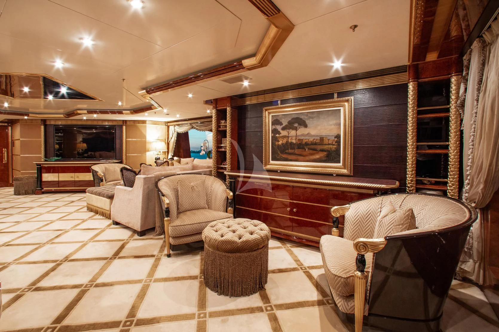a living room with a large mirror aboard SORRENTO Yacht for Sale