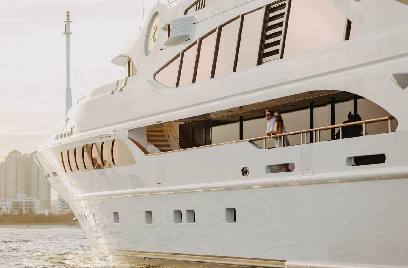 a white boat with people on it aboard SORRENTO Yacht for Sale