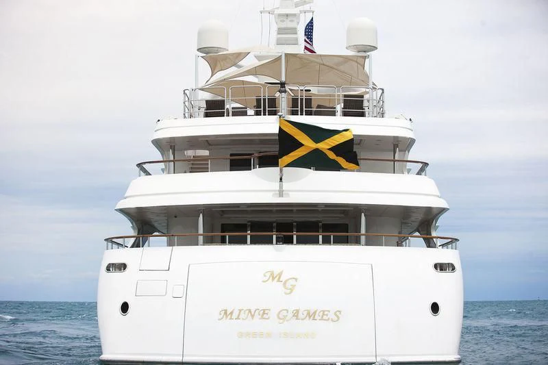 a white boat with a yellow star on it aboard SORRENTO Yacht for Sale