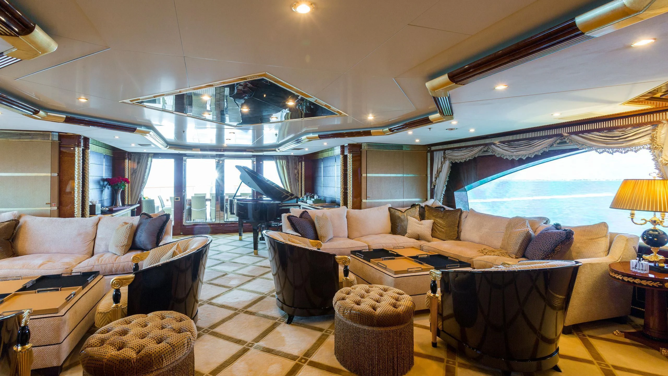 a living room with a large window aboard SORRENTO Yacht for Sale