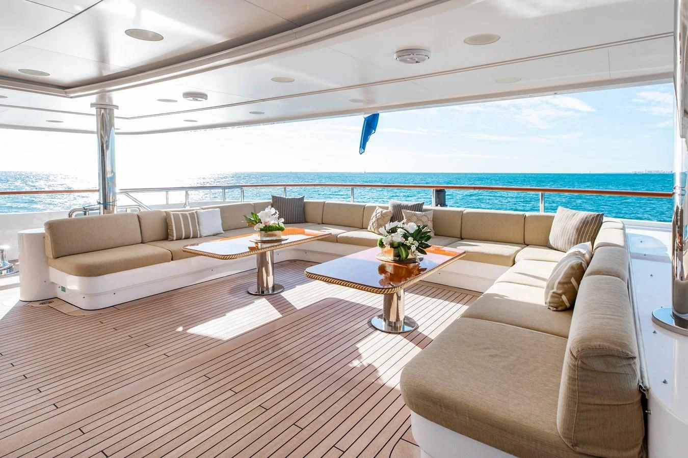 a living room with a couch and a table aboard SORRENTO Yacht for Sale