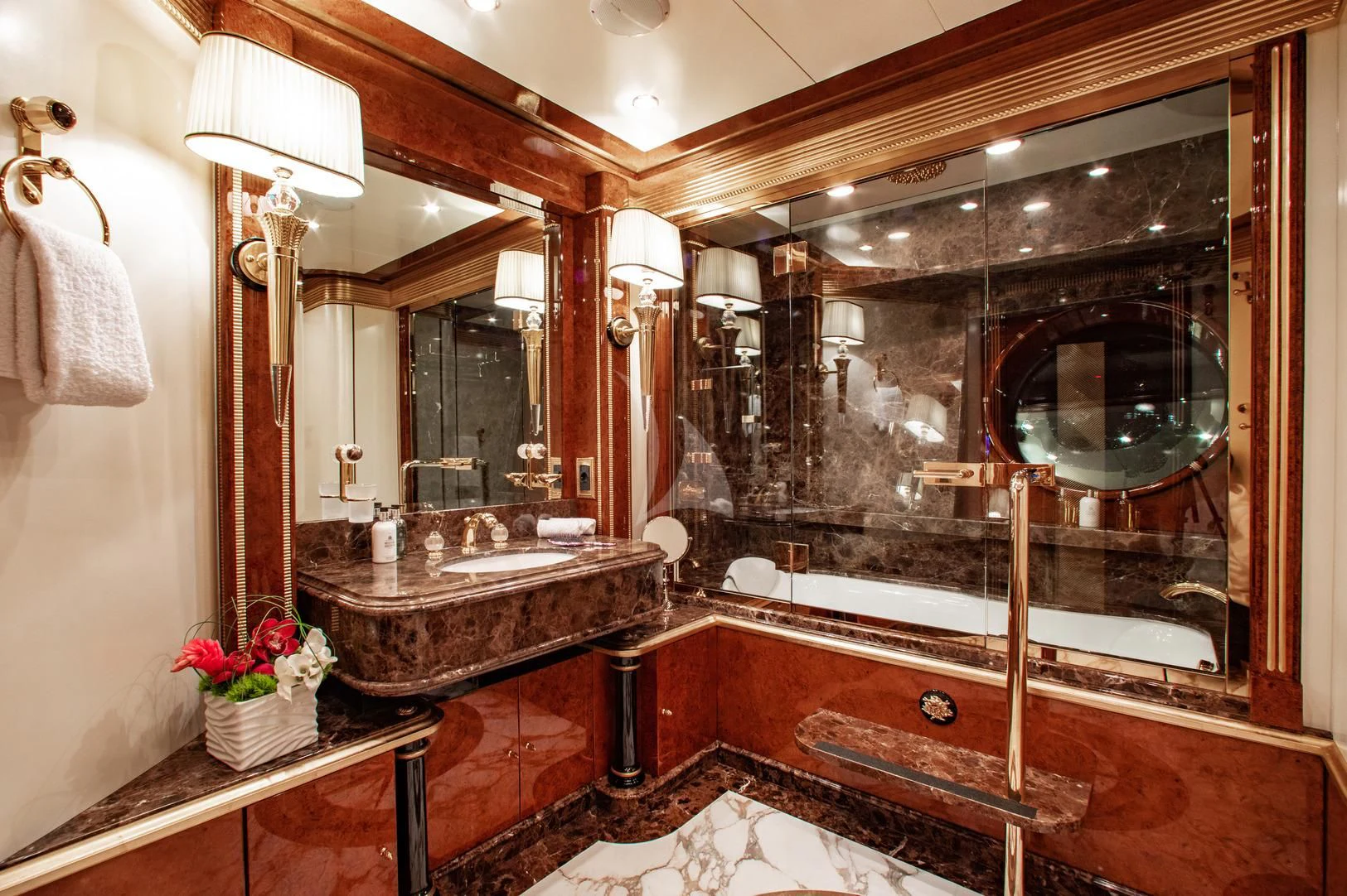 a bathroom with a large mirror aboard SORRENTO Yacht for Sale