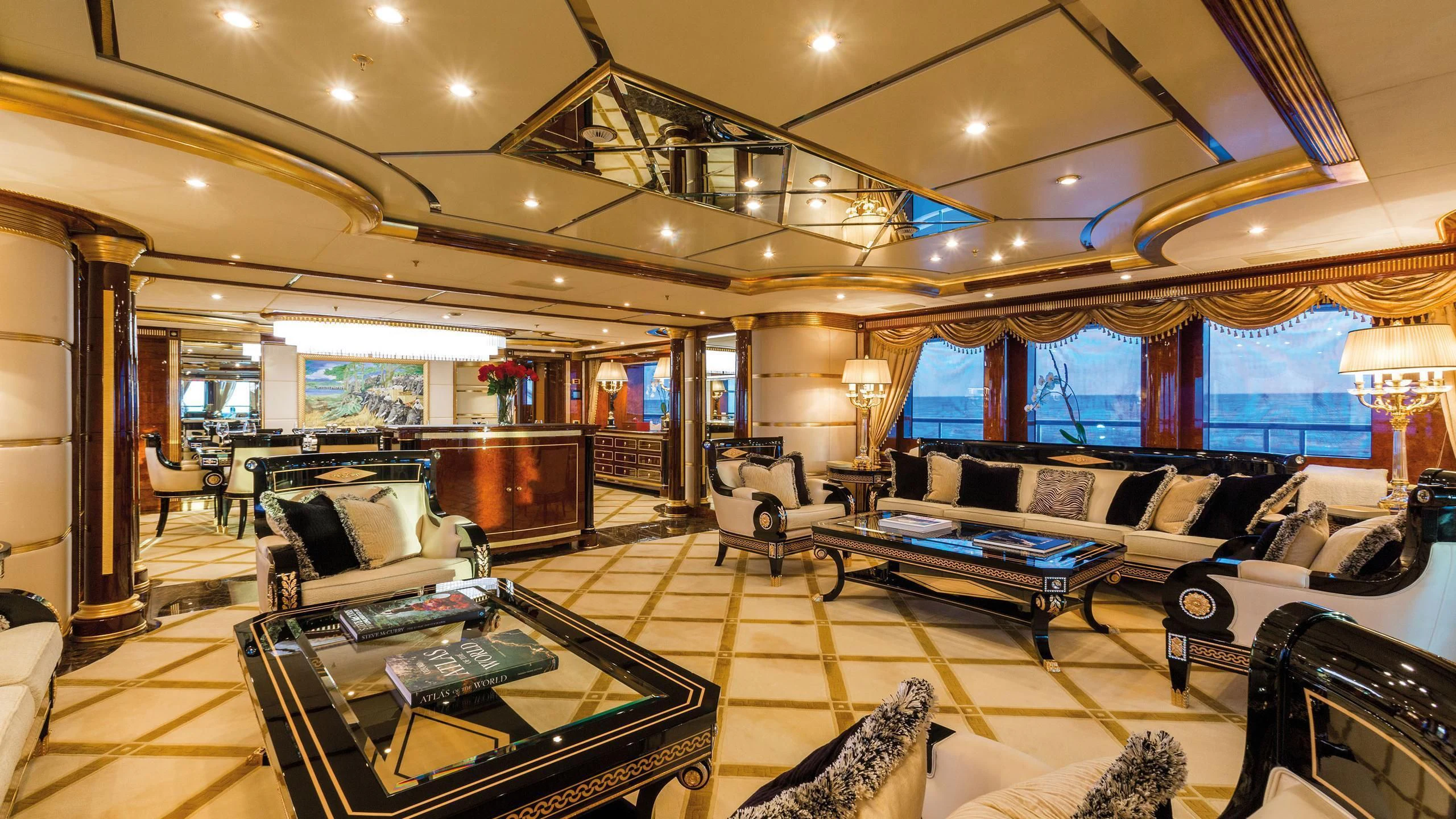 a living room with a large screen aboard SORRENTO Yacht for Sale