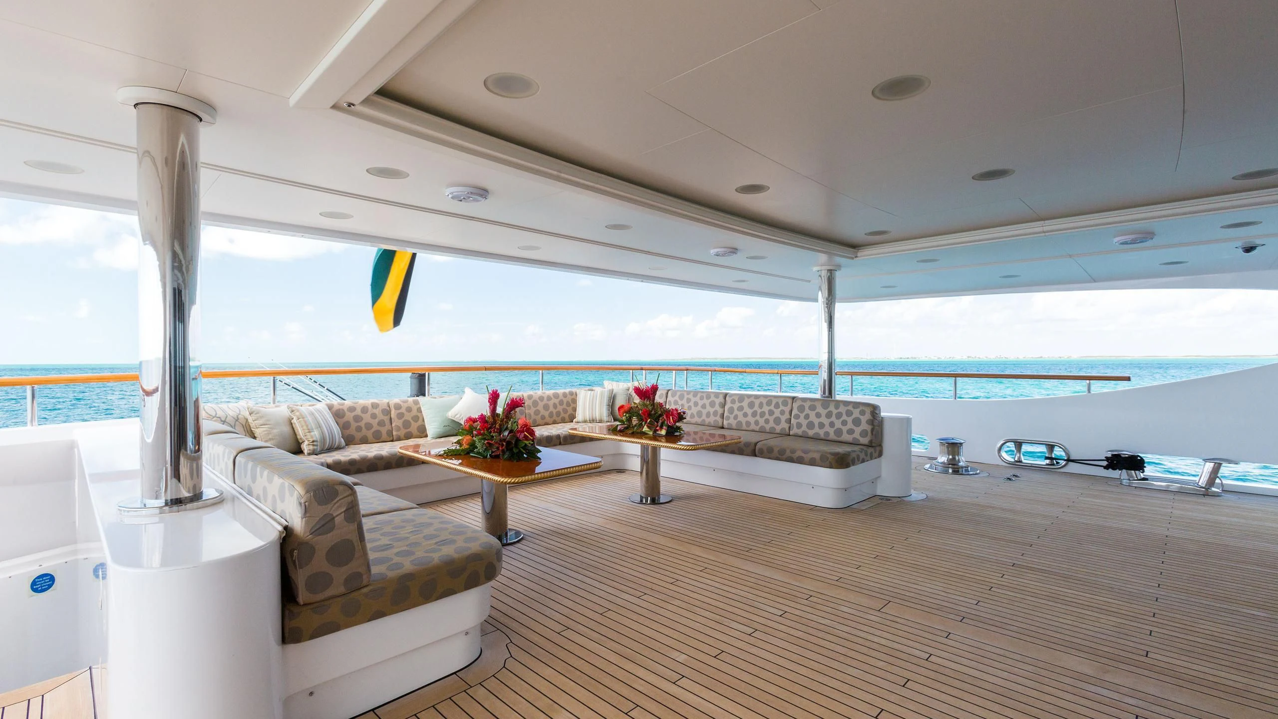 a room with a table and chairs aboard SORRENTO Yacht for Sale