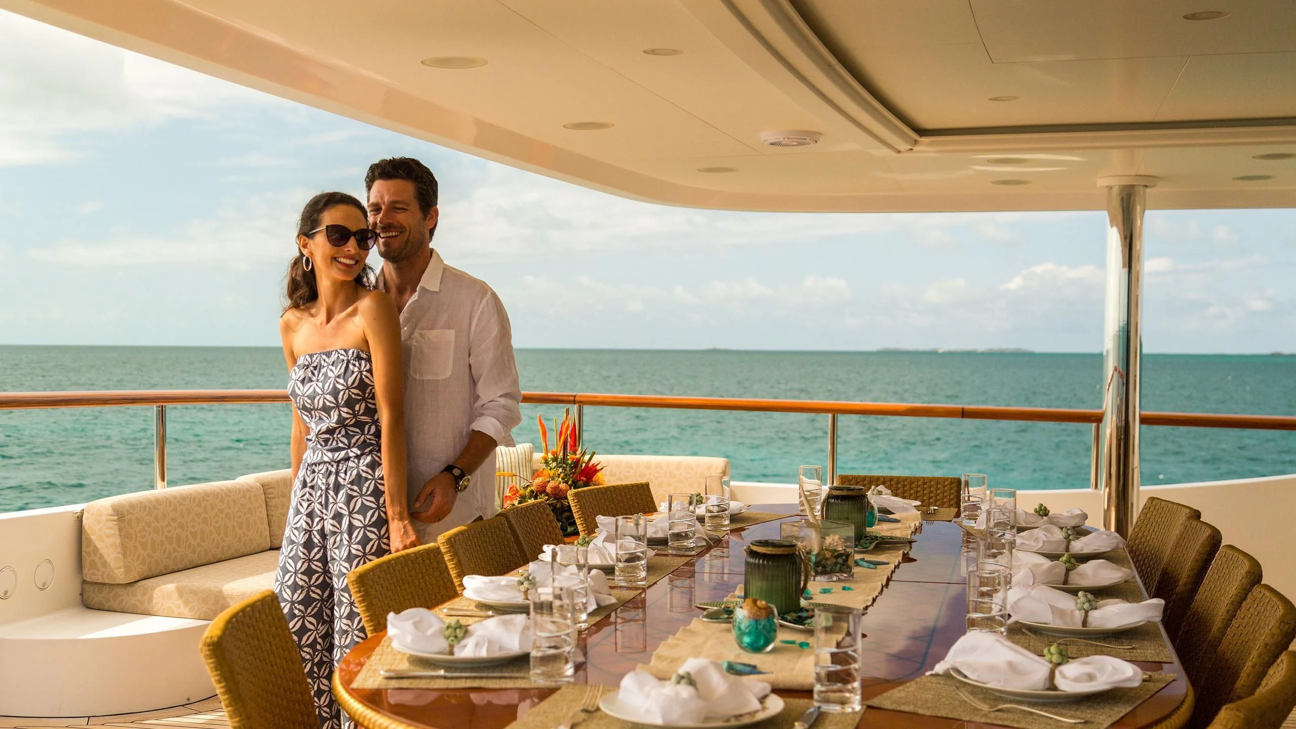 a couple kissing on a balcony aboard SORRENTO Yacht for Sale