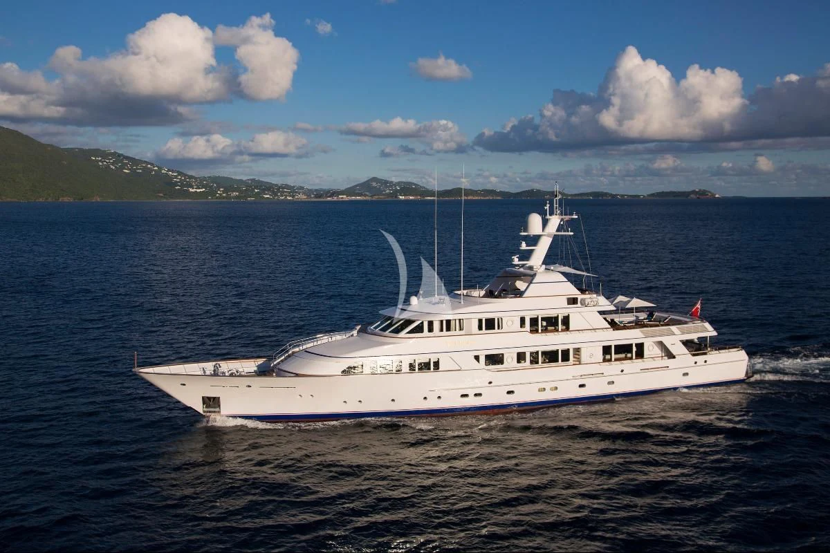 a white boat in the water aboard TELEOST Yacht for Sale