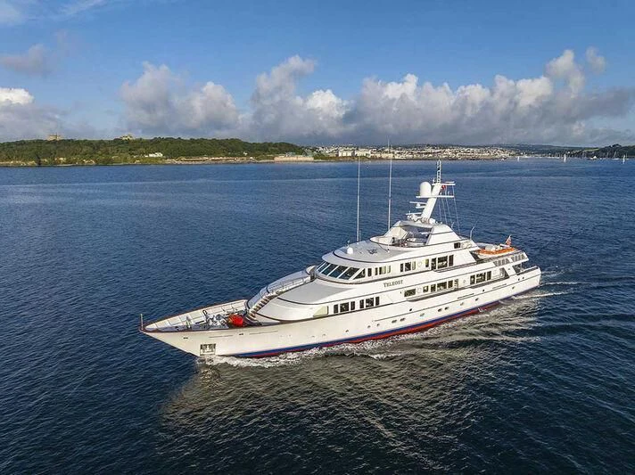 a large white boat in the water aboard TELEOST Yacht for Sale