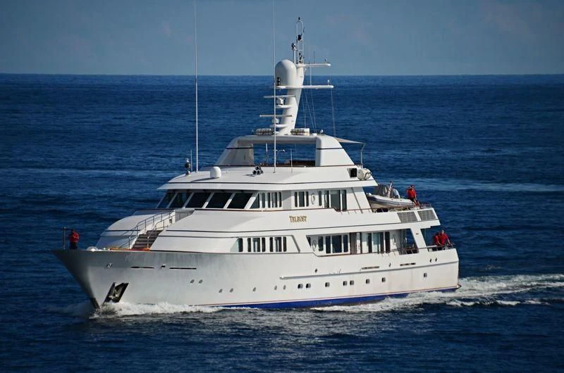 a white boat on the water aboard TELEOST Yacht for Sale