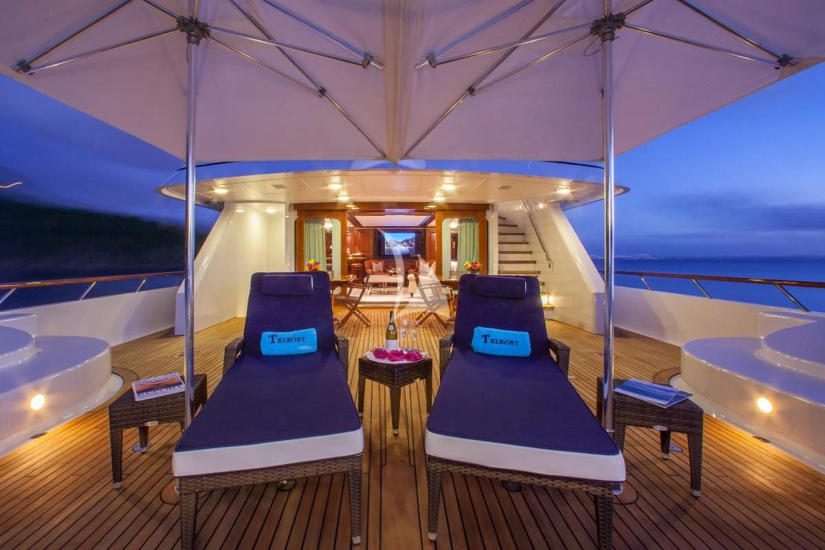 a tent with a bed and a table aboard TELEOST Yacht for Sale
