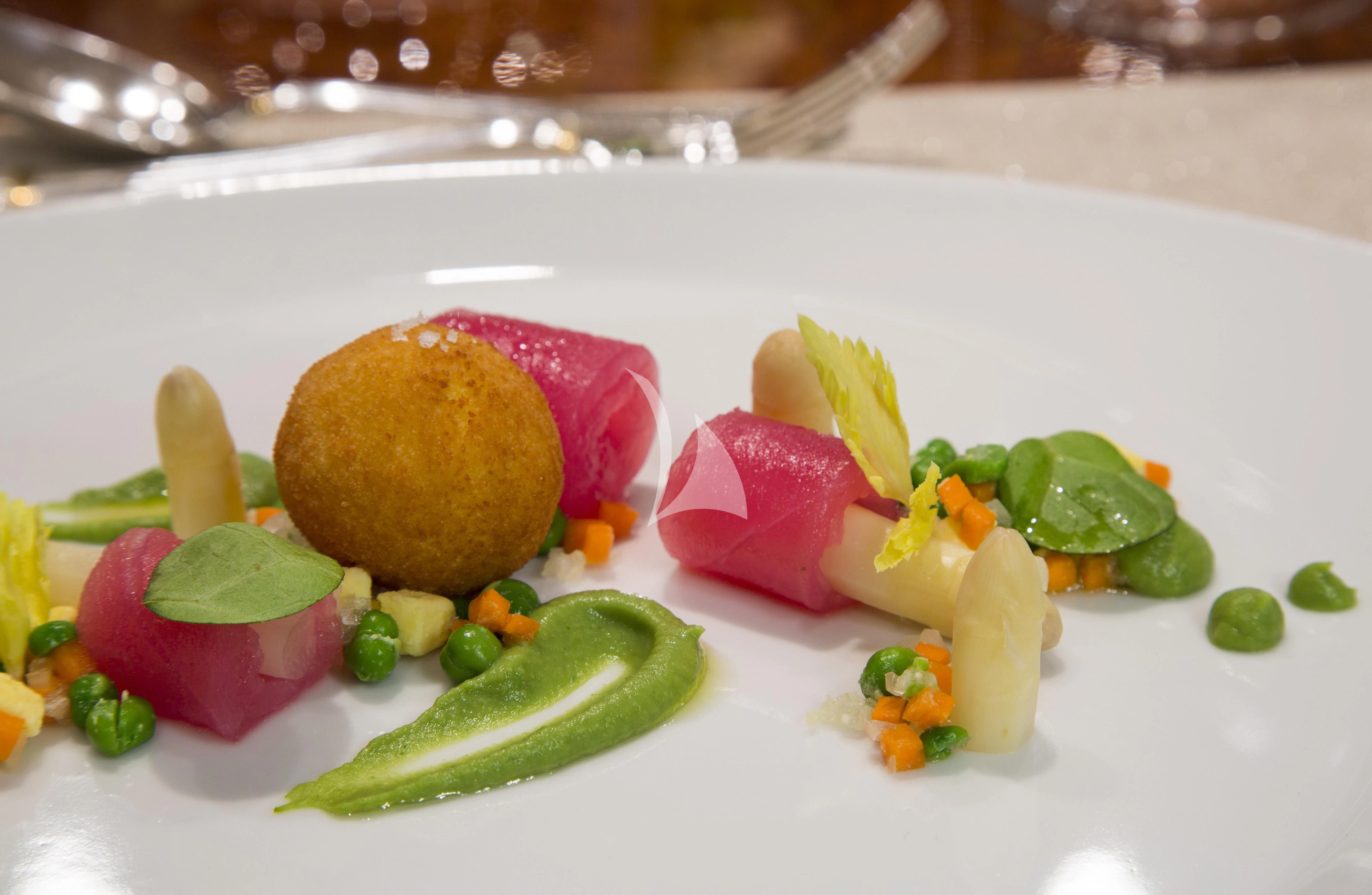 a plate of food aboard TELEOST Yacht for Sale