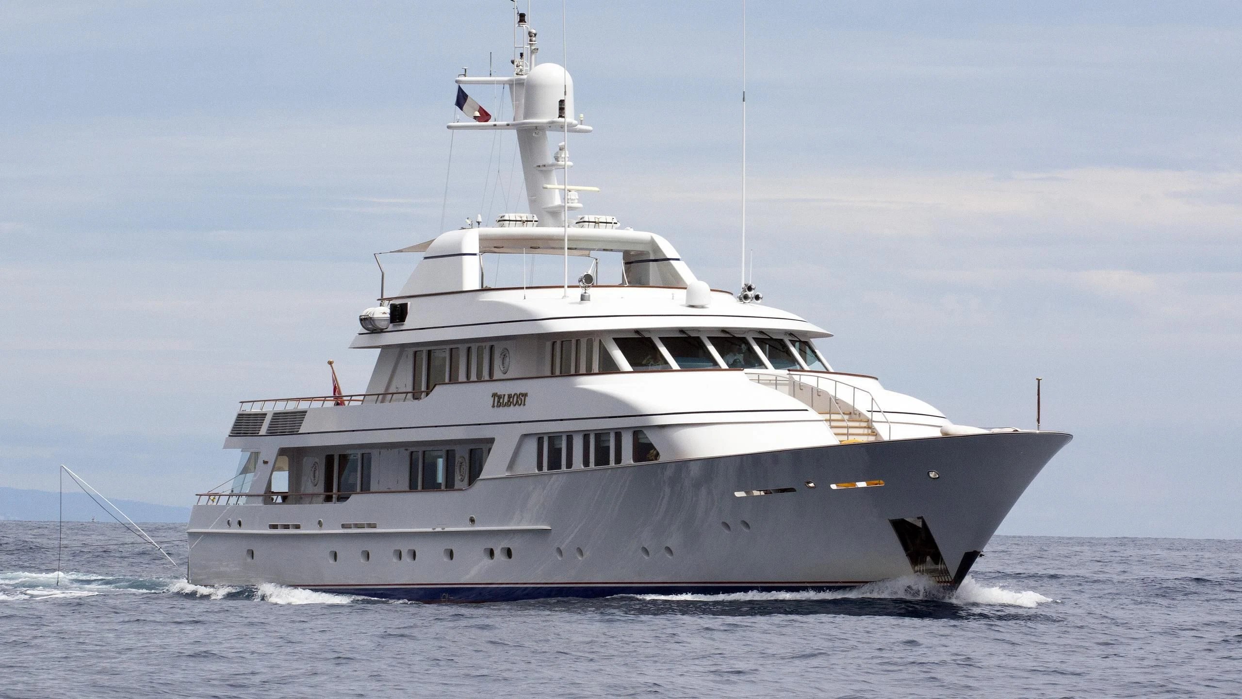 a large white boat aboard TELEOST Yacht for Sale