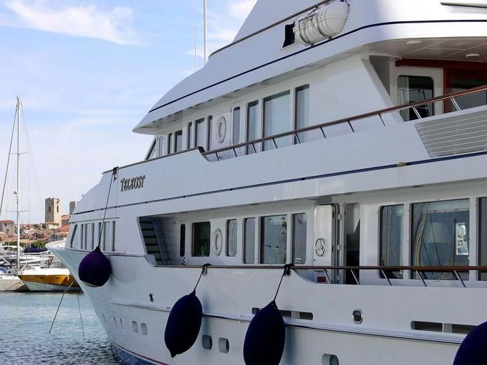 a white boat on the water aboard TELEOST Yacht for Sale