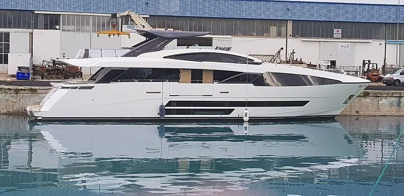 a white yacht in a large body of water aboard SEDA Yacht for Sale