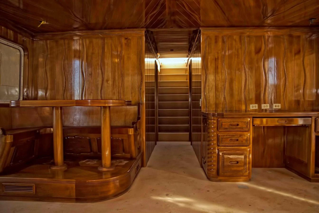 a room with wooden cabinets aboard PRINCIPE DEL MAR Yacht for Sale