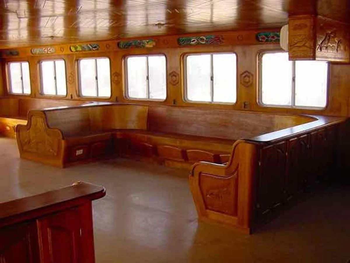 a room with wooden benches aboard PRINCIPE DEL MAR Yacht for Sale
