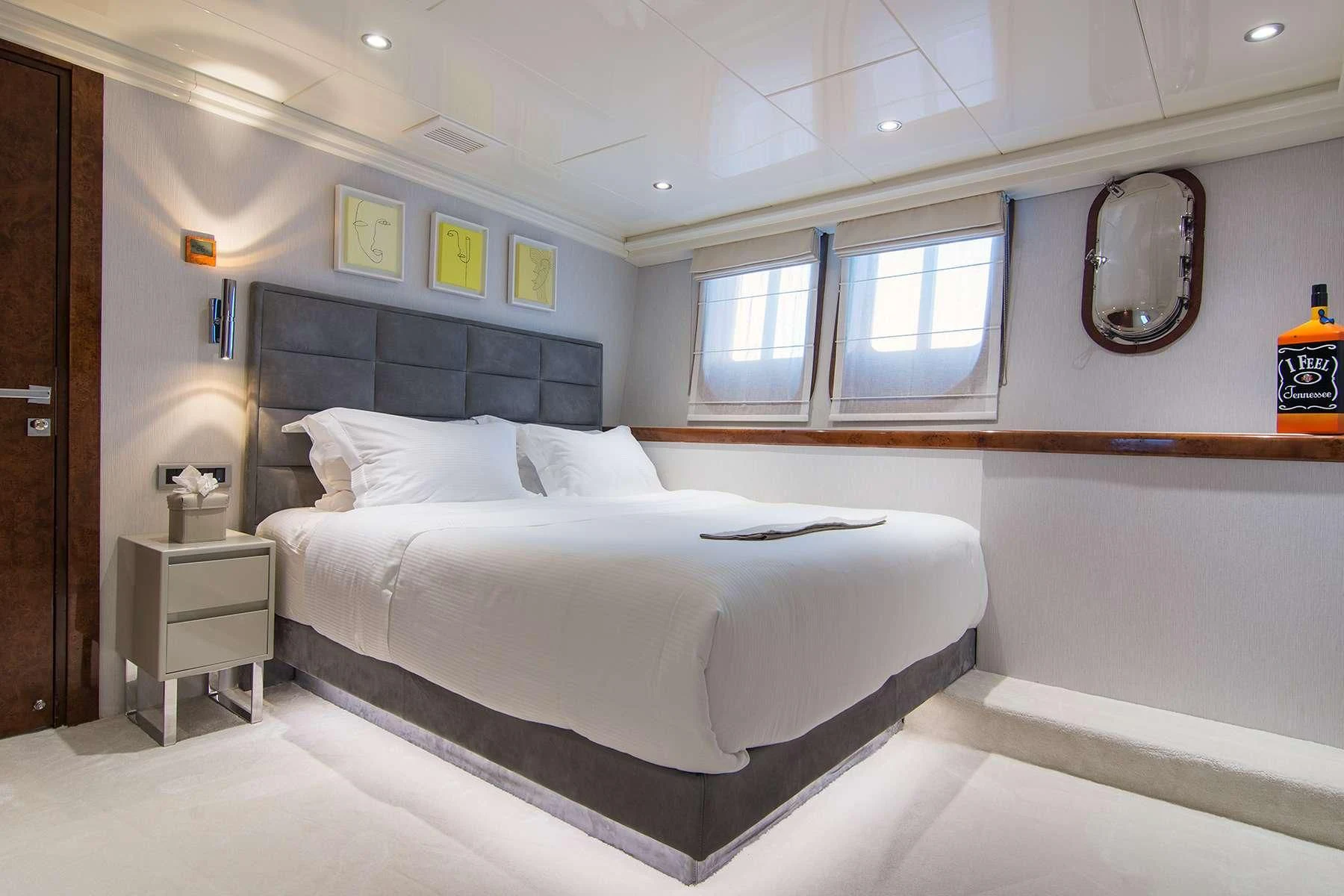 a bed in a room aboard HALLO Yacht for Sale