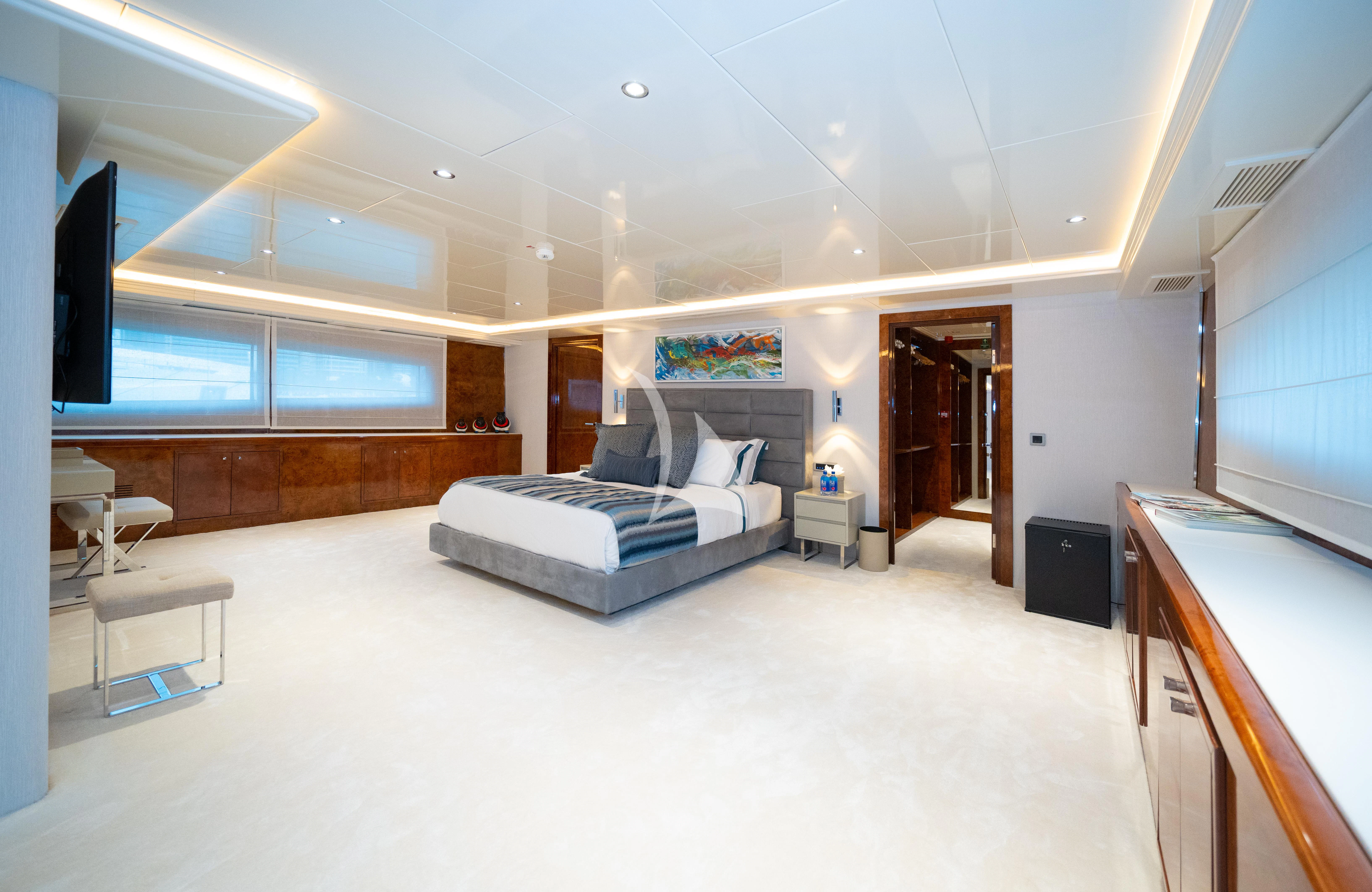 a room with a couch and a table aboard HALLO Yacht for Sale