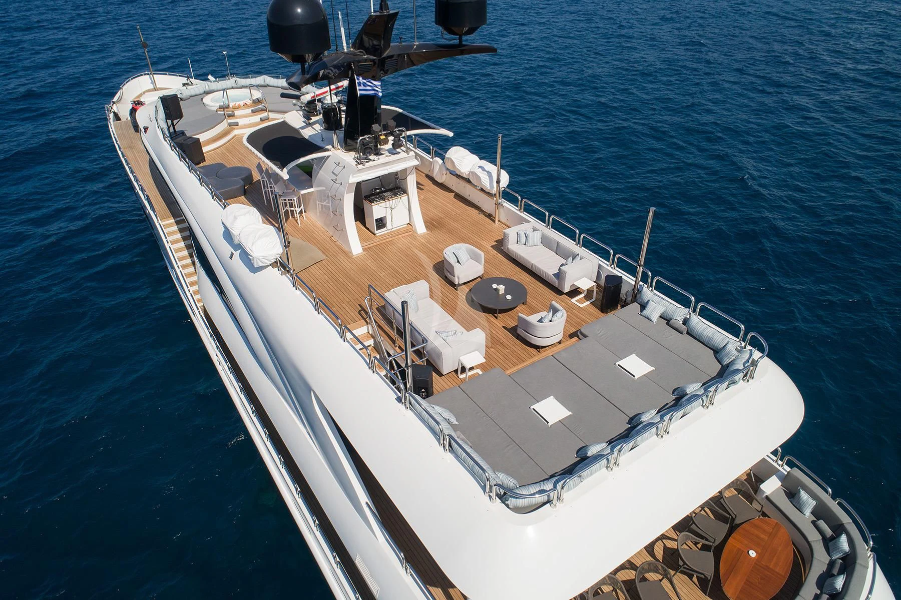 a large ship in the water aboard HALLO Yacht for Sale