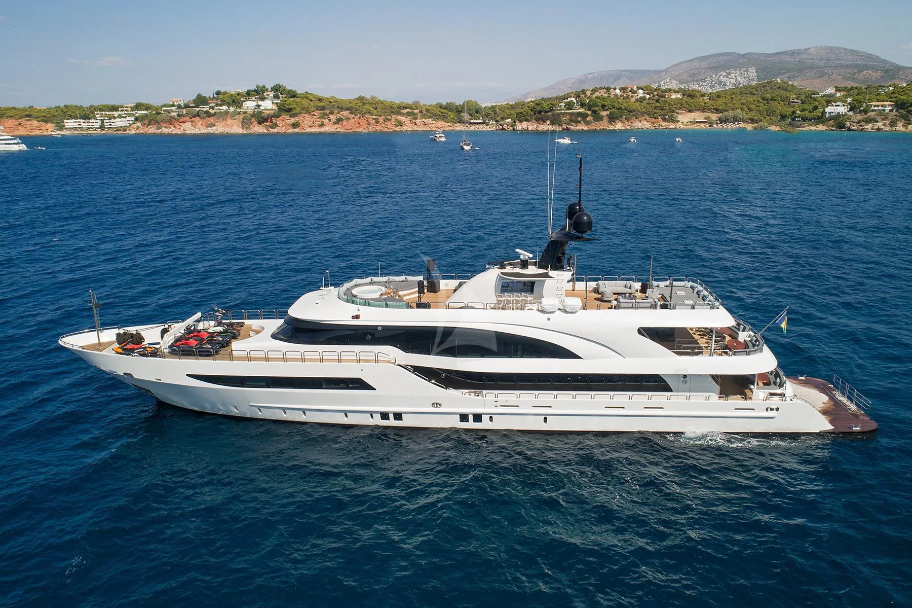 a white yacht in the water aboard HALLO Yacht for Sale